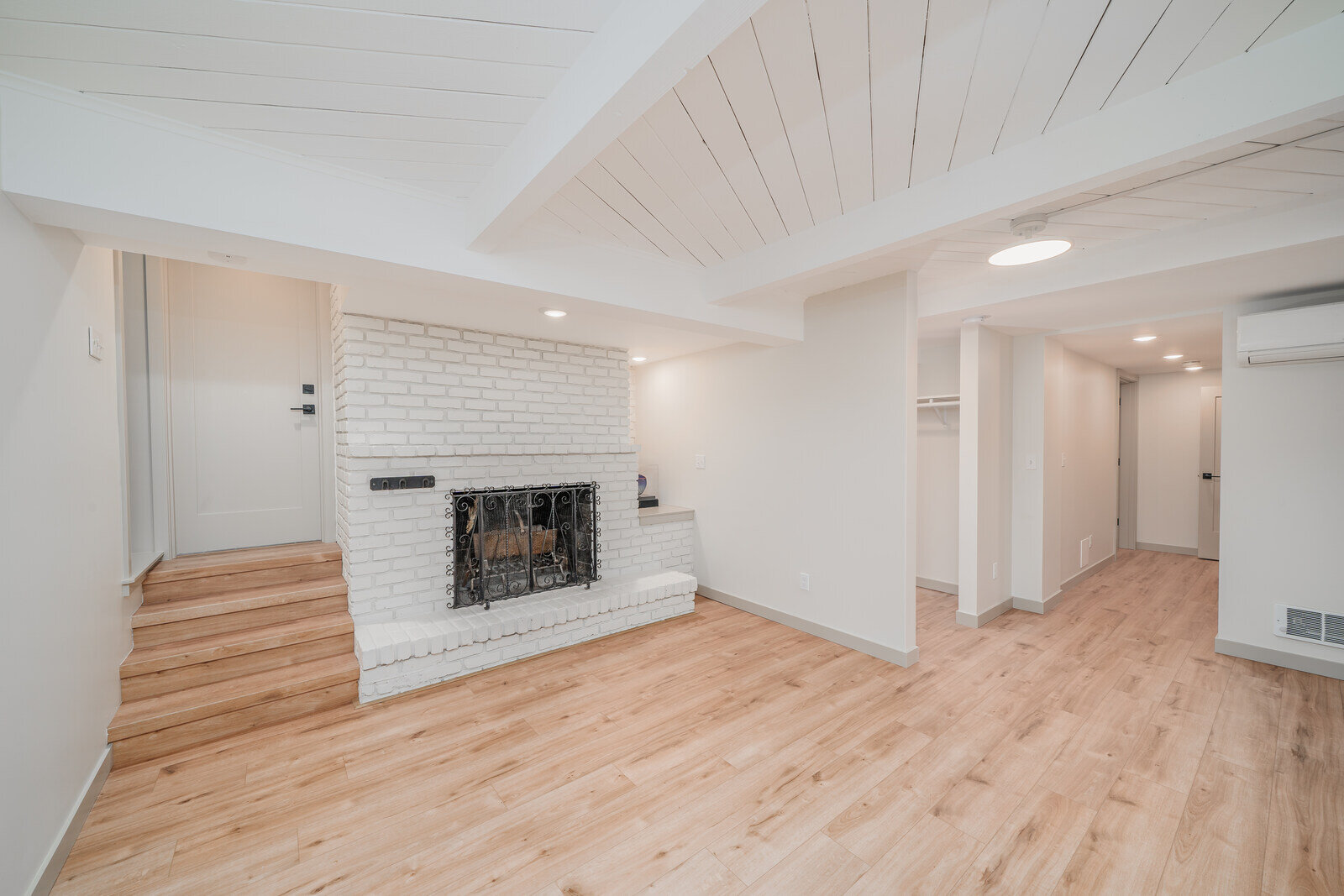 Renovated Seattle basement ADU living area with a focus on natural light, by CB Construction