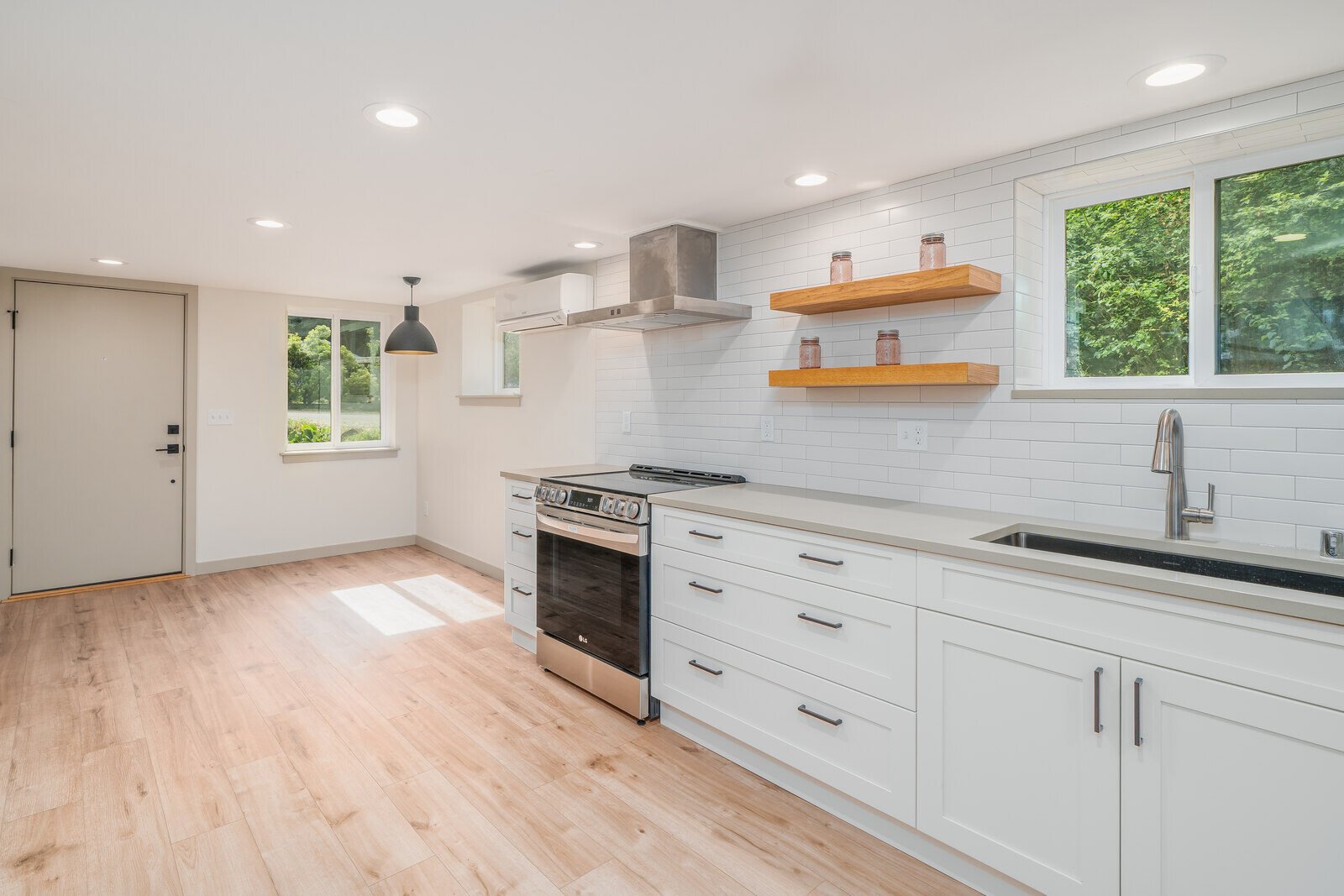 Bright basement ADU kitchen with natural light in Seattle, completed by CB Construction